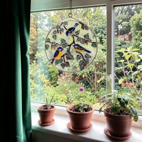 Cinkék faágon üvegfestmény